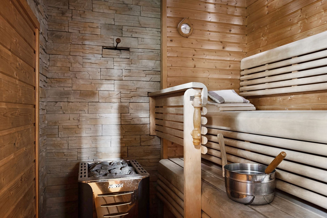 Sauna interior with wood and stone walls and bench framing