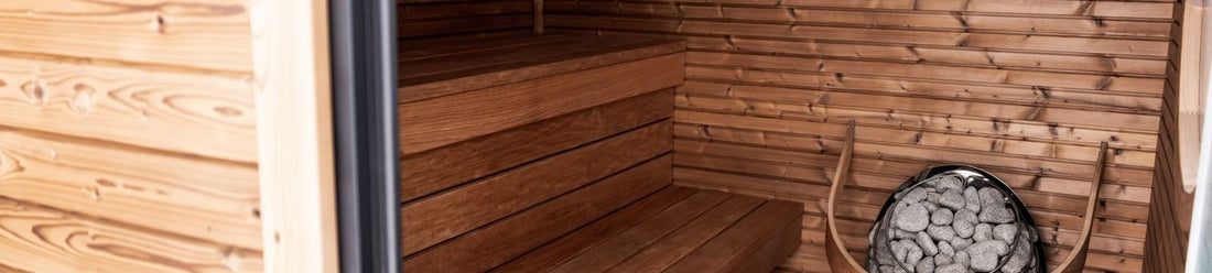 Infrared sauna cabin interior compared with an infrared sauna blanket for home heat therapy