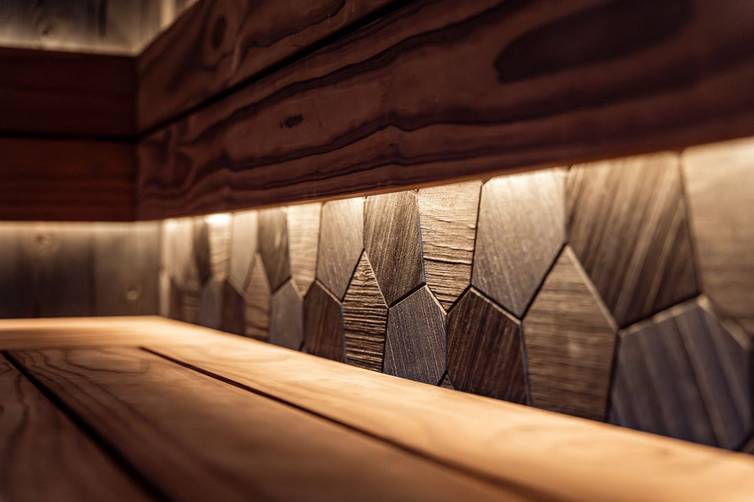 Warm cedar sauna bench with soft LED lighting and textured wood wall for relaxation before sleep