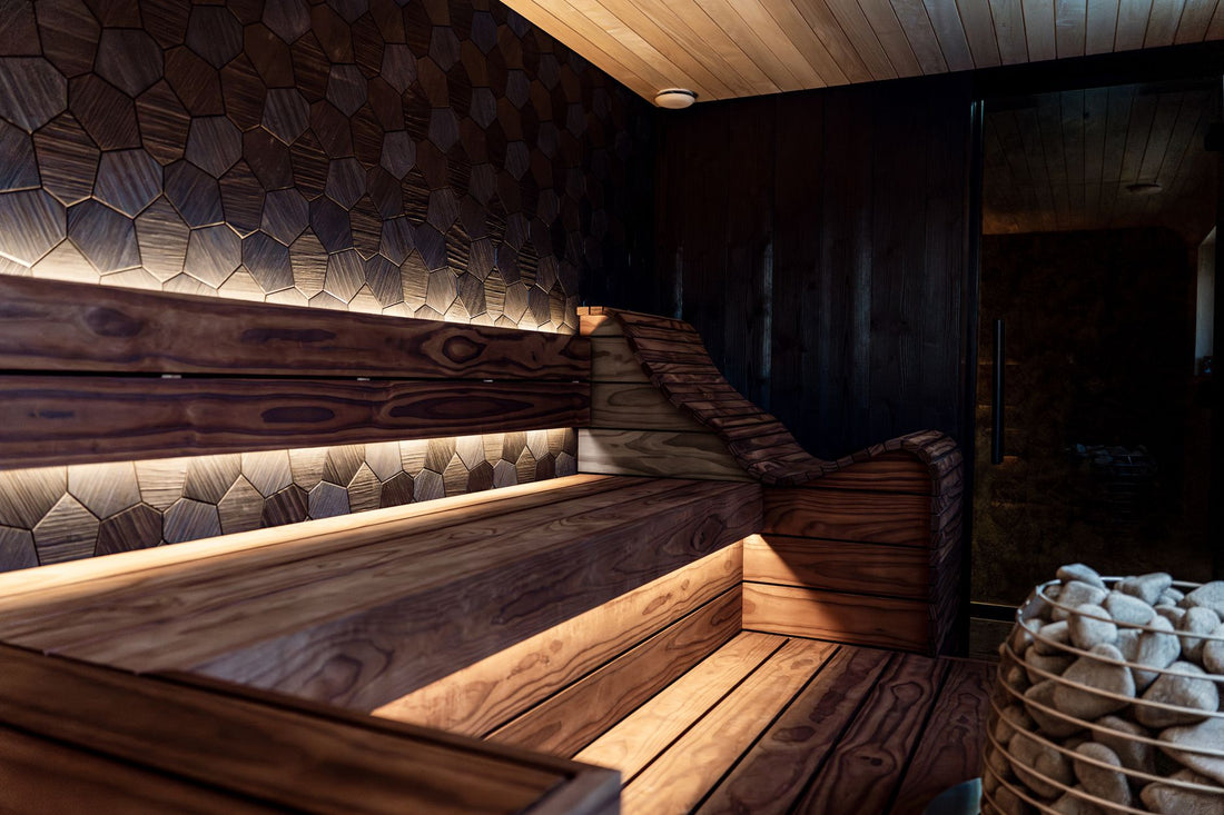 Full spectrum infrared sauna interior with wood benches and ambient lighting