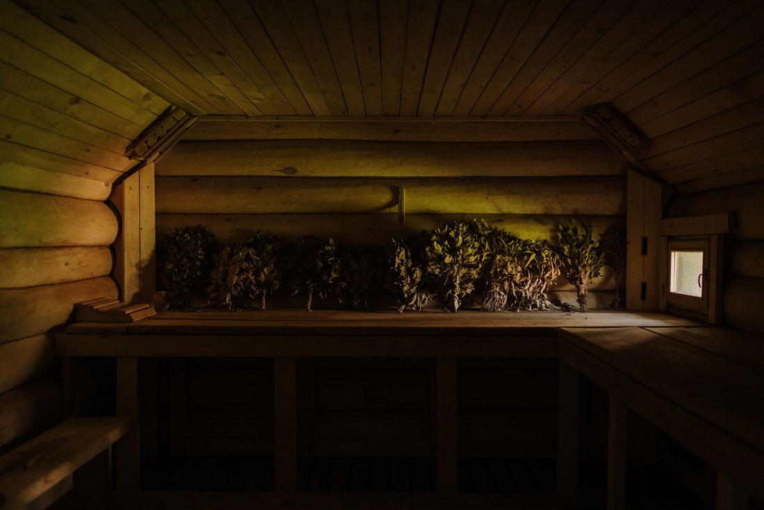 Modern wooden infrared sauna interior with heater and benches