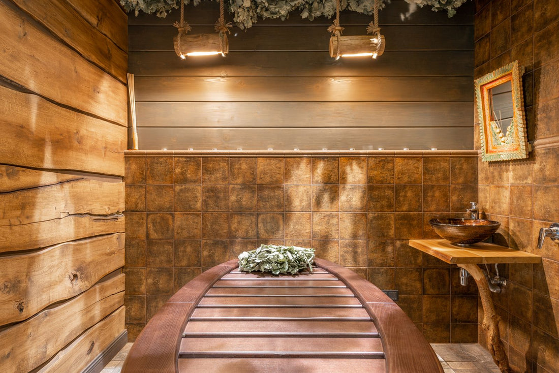 Modern wooden infrared sauna interior with heater and benches