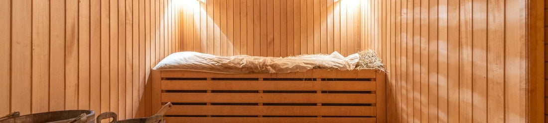 Infrared sauna interior with carbon heating panels and wood benches to evaluate when buying