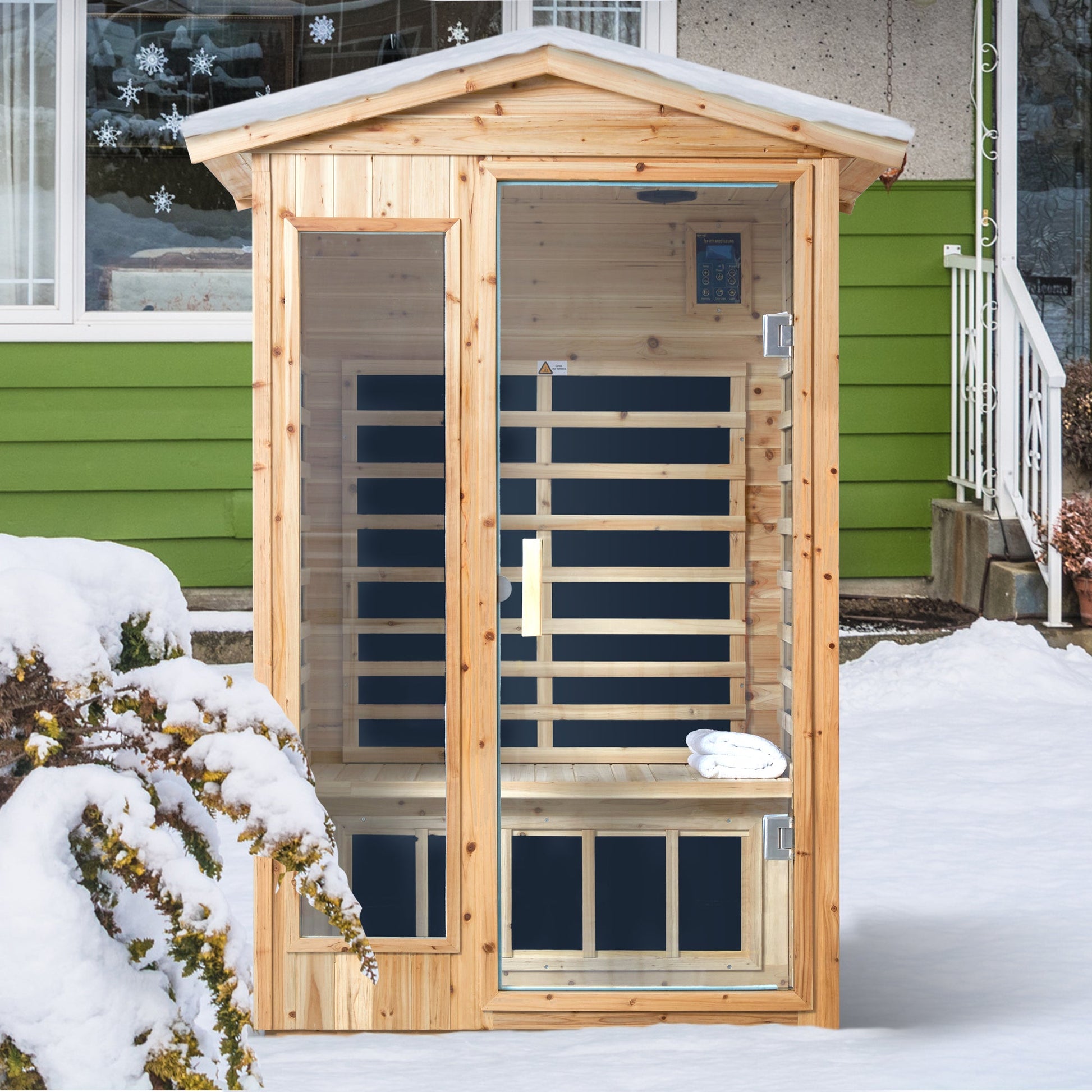 Two person old fir outdoor sauna room installed in snow beside a house