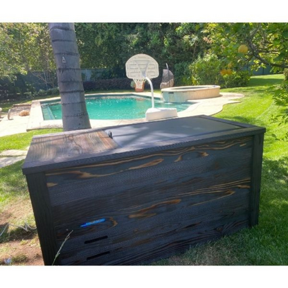 Kooru cold plunge tub set up on grass in a backyard near a pool