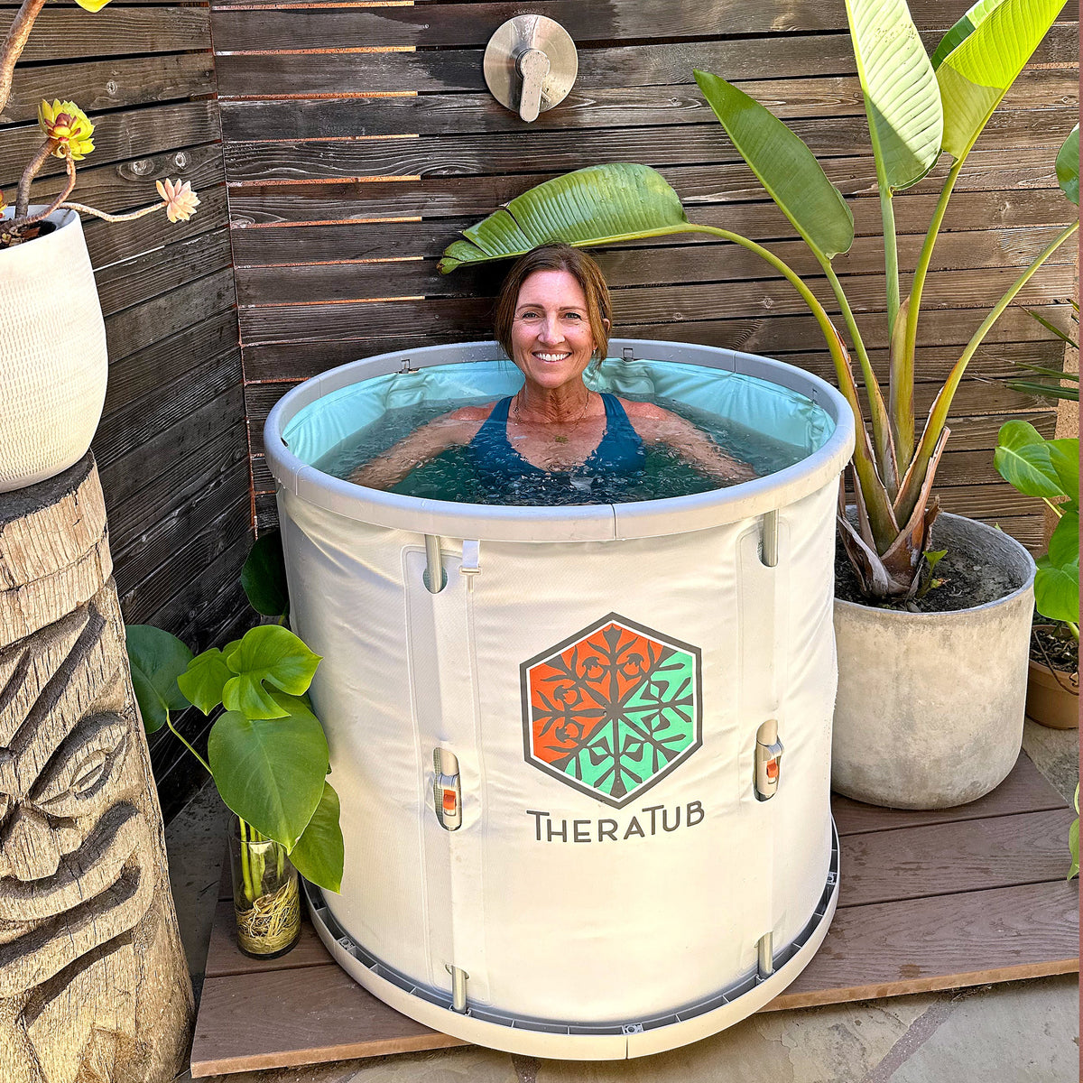 Person in the TheraTub portable cold plunge