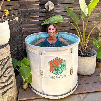 Person in the TheraTub portable cold plunge