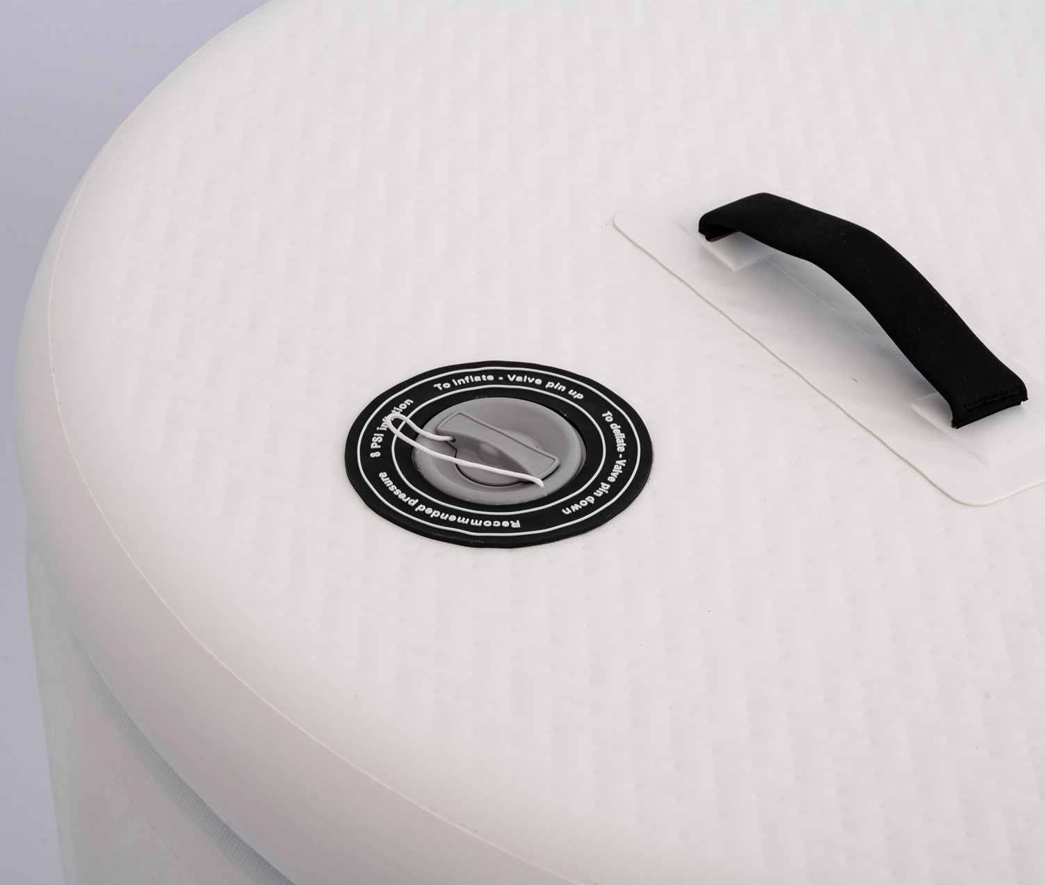 Inflation valve and carry handle on the RevX Inflatable Classic lid