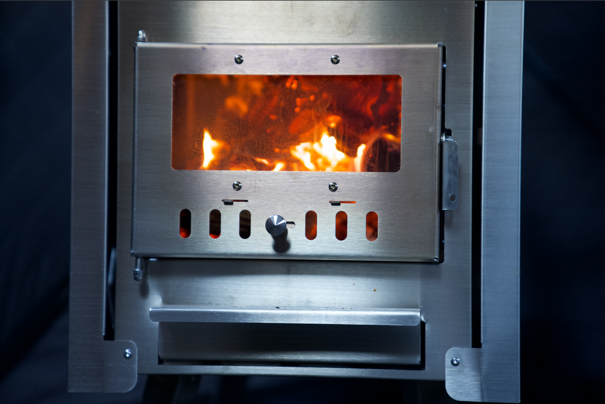 XL stainless steel sauna tent wood stove, front view, North Shore Sauna