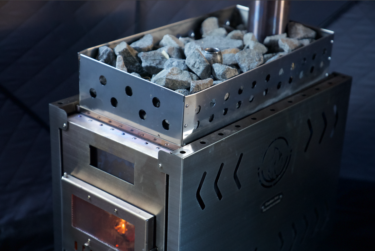 Stainless steel wood-burning tent stove with sauna stone basket and glass fire door