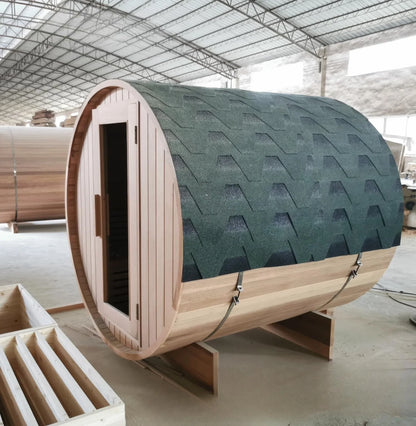 Red cedar outdoor barrel sauna with shingled roof and glass door, Restore Suite