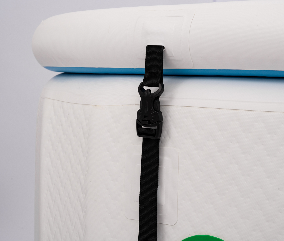 Close detail of the lid buckle strap on the RevX Inflatable Classic