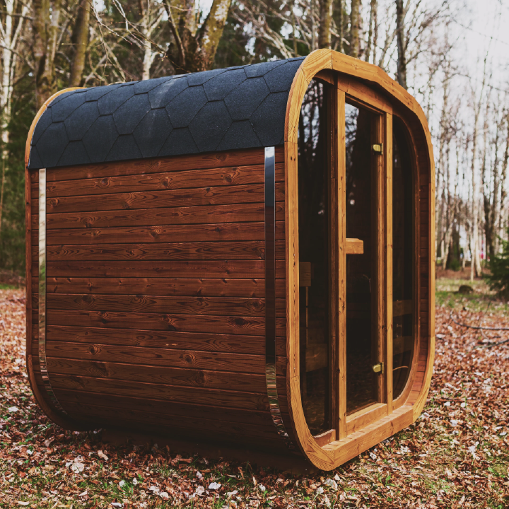 Outdoor ThermoWood sauna in garden