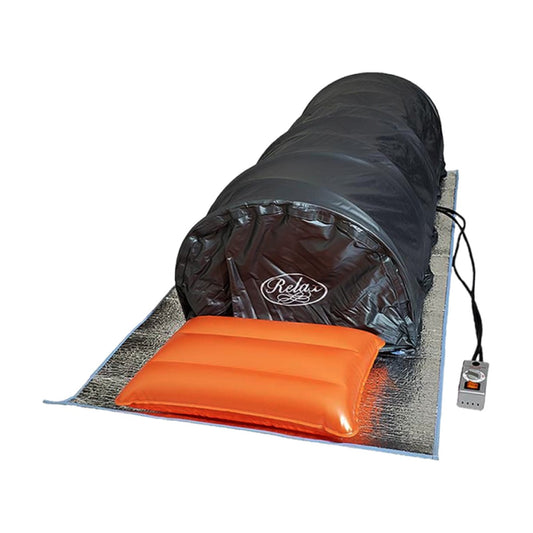 Relax Flex lie-down far infrared sauna, assembled with reflective mat, pillow and controller, on white background