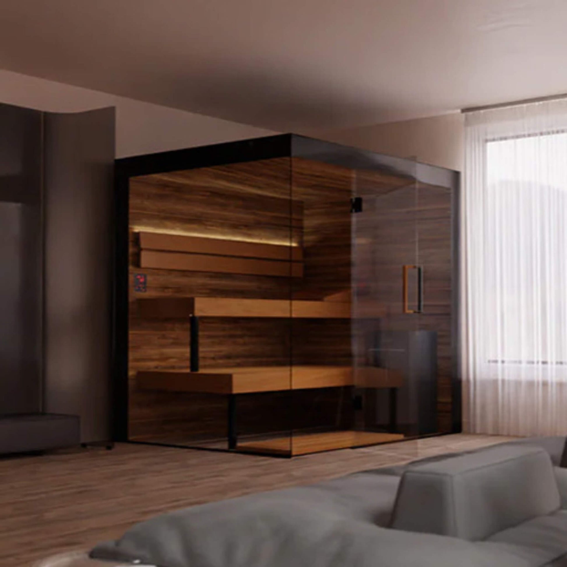ThermaSol Lumaria glass sauna cabin in a dim room beside a sofa